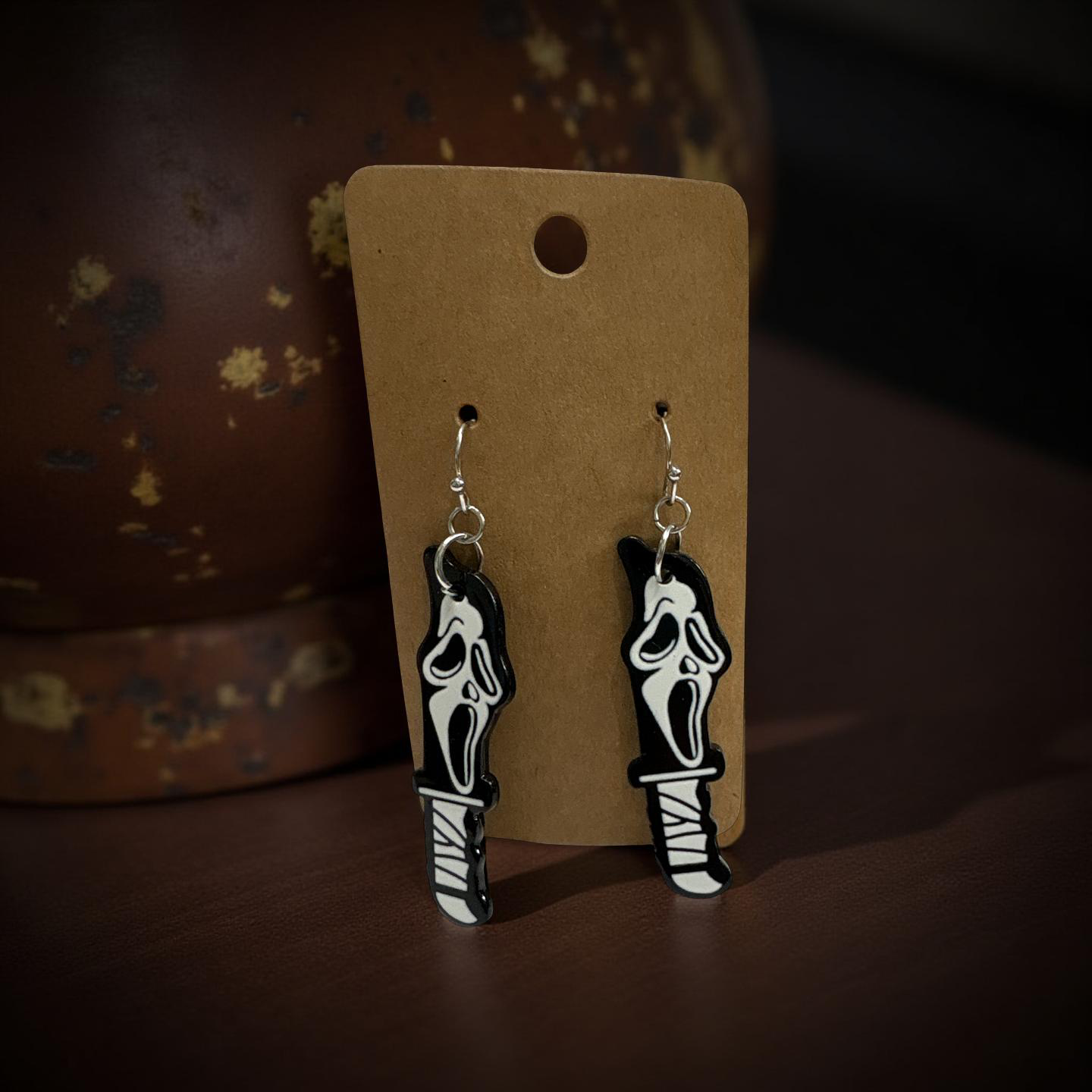 G Face Earrings